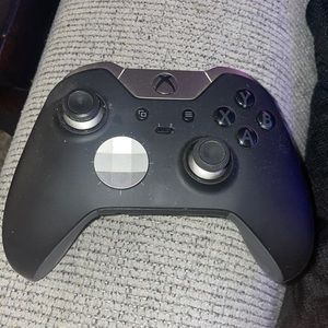Xbox Elite Controller Series 1 with rechargeable battery pack.
